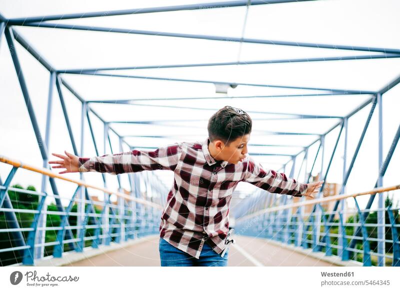 Gypsy boy singing flamenco on a bridge shirts Checked Shirt checkered shirt Plaid Shirts human human being human beings humans person persons Mixed Race