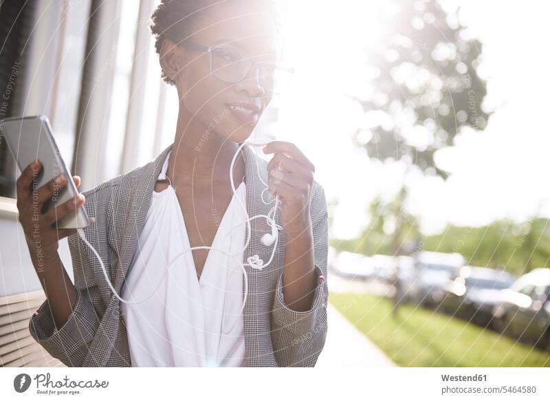 Portrait of smiling businesswoman on the phone portrait portraits smile businesswomen business woman business women business people businesspeople