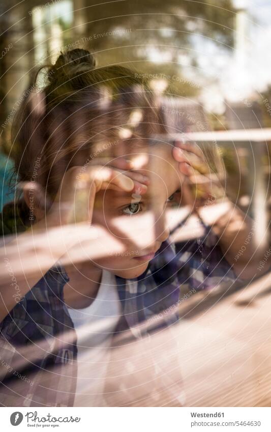 Portrait of girl looking through window human human being human beings humans person persons Mixed Race mixed race ethnicity mixed-race Person 1 one person only