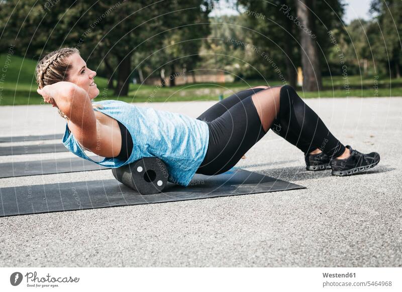 Boxer doing sit ups outdoors a Royalty Free Stock Photo from