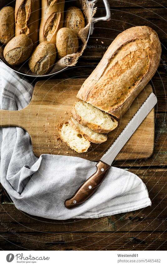 Sliced ciabatta on wooden board nobody delicacy specialty specialties Italian Food Italian cuisine sliced wooden boards wooden panel wooden panels Ciabatta