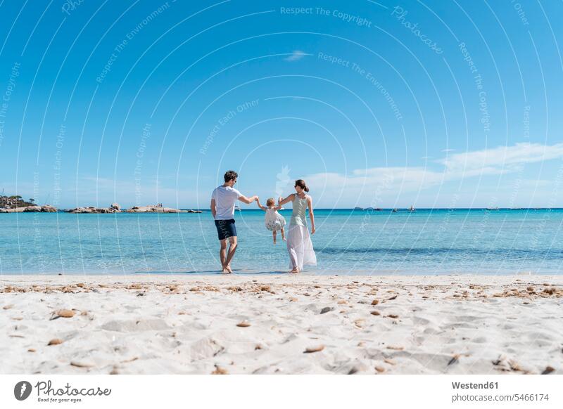 Happy family on the seashore human human being human beings humans person persons caucasian appearance caucasian ethnicity european Group groups of people few