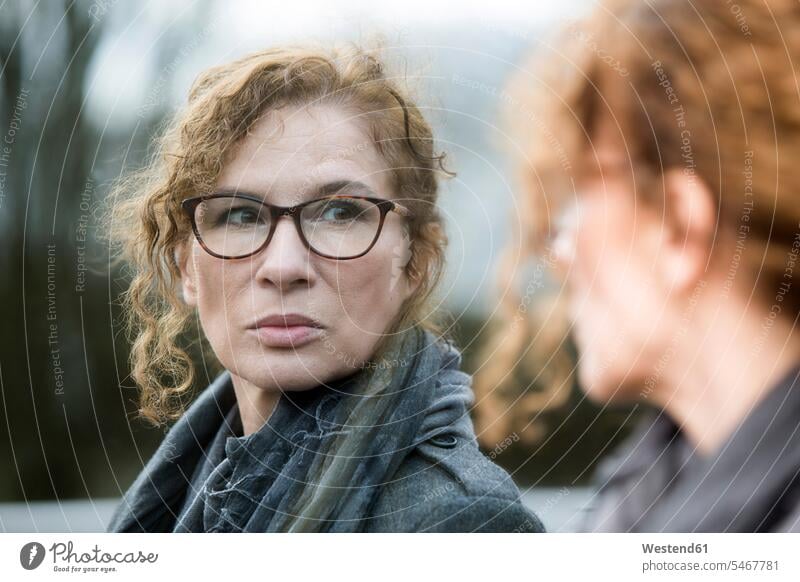 Portrait of mature woman, pensive, mirror image reflexion reflection females women portrait portraits serious earnest Seriousness austere thoughtful Reflective