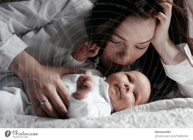 Close-up of woman with her baby son human human being human beings humans person persons 2 2 people 2 persons two two persons caucasian appearance