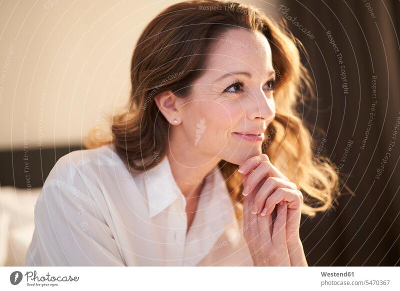 Portrait of smiling woman in bedroom at home smile in the morning relax relaxing relaxation pleased free time leisure time indoor indoor shot indoor shots