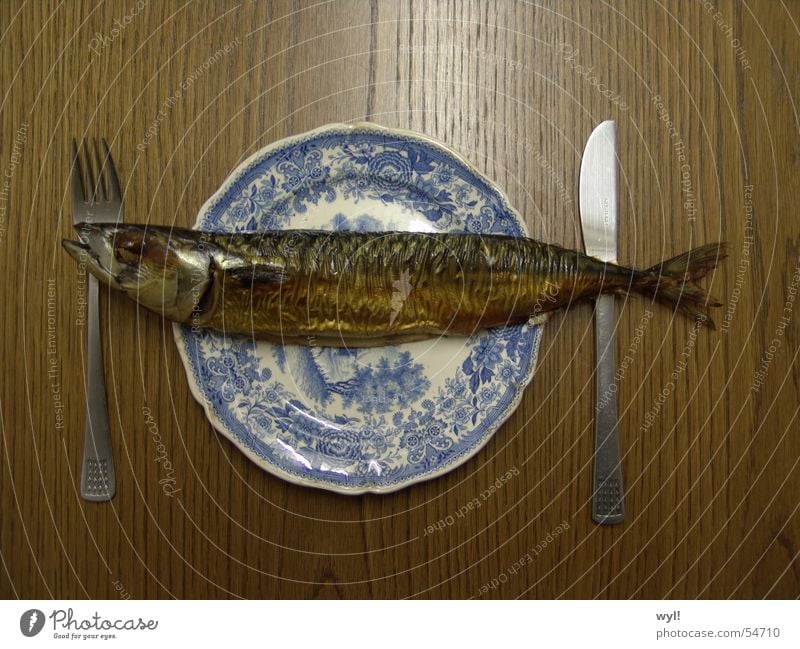 Meal fish. Mackerel Herring Smoked Plate Cutlery Table Friday Fresh Fish bone Delicious Macabre Nutrition Water wings Kipper