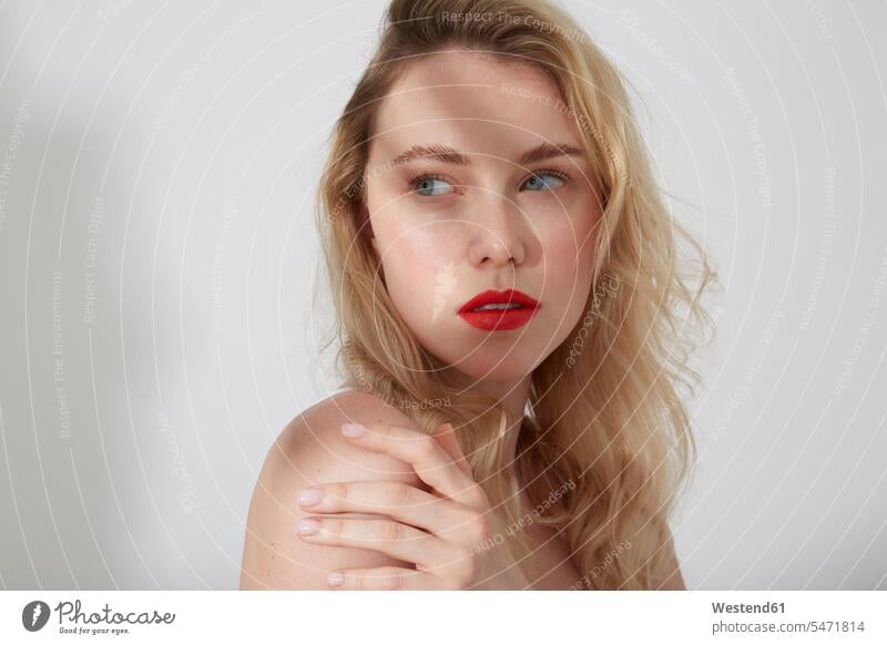 Portrait of young blond woman with red lips and shadow on her face human human being human beings humans person persons caucasian appearance caucasian ethnicity