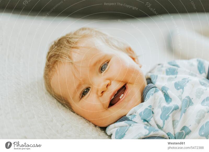 Portrait of a smiling baby girl human human being human beings humans person persons caucasian appearance caucasian ethnicity european 1 one person only