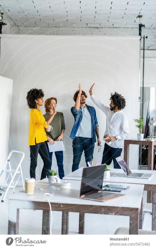 Young entrepreneurs having a meeting in their office startup young business start up startup company startups young company startup companies start-up start-ups