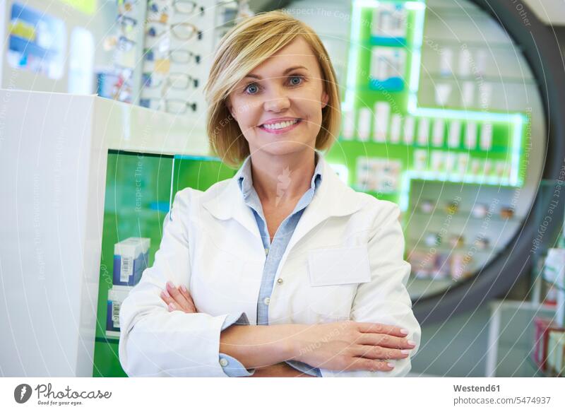 Portrait of smiling pharmacist chemists smile portrait portraits healthcare and medicine medical Healthcare And Medicines caucasian caucasian ethnicity