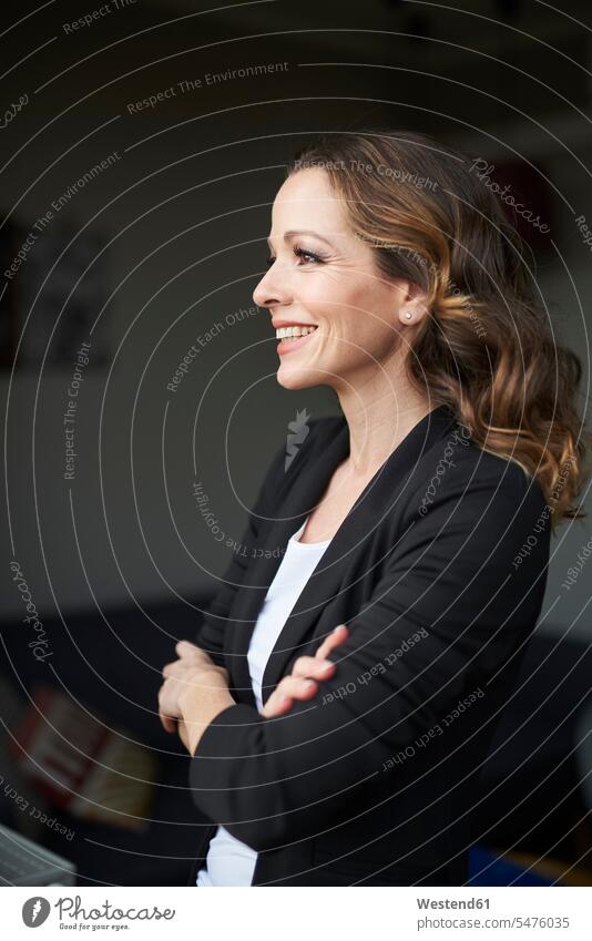 Portrait of happy brunette businesswoman looking away business life business world business person businesspeople business woman business women businesswomen