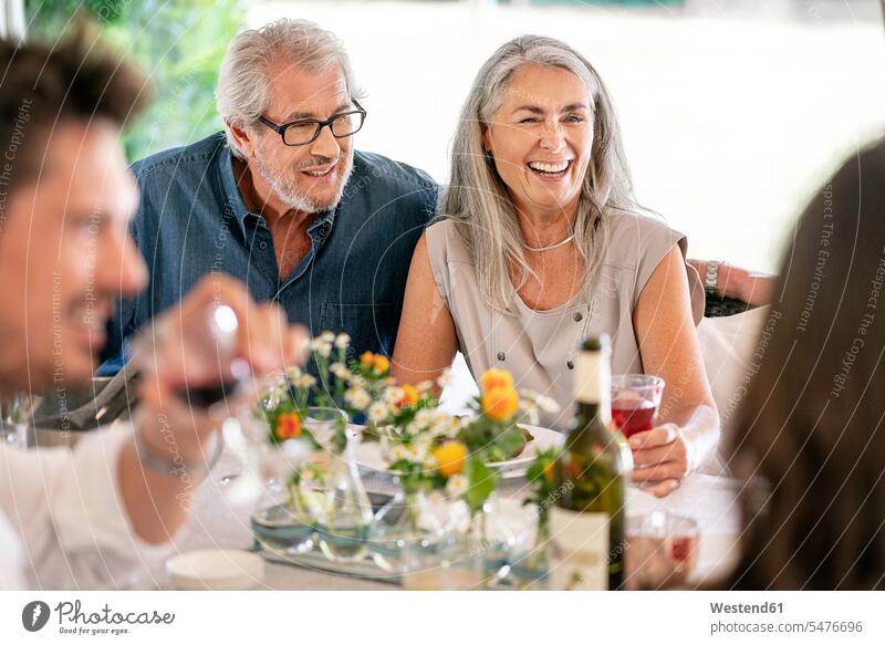 Happy family having meal together Meals happiness happy families Food foods food and drink Nutrition Alimentation Food and Drinks people persons human being