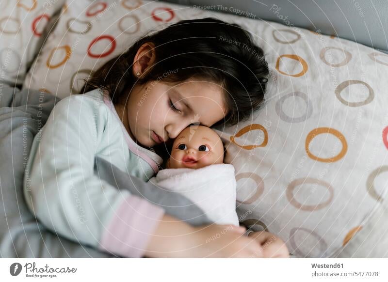 Sleeping little girl with her doll human human being human beings humans person persons 1 one person only only one person children kid kids female females girls
