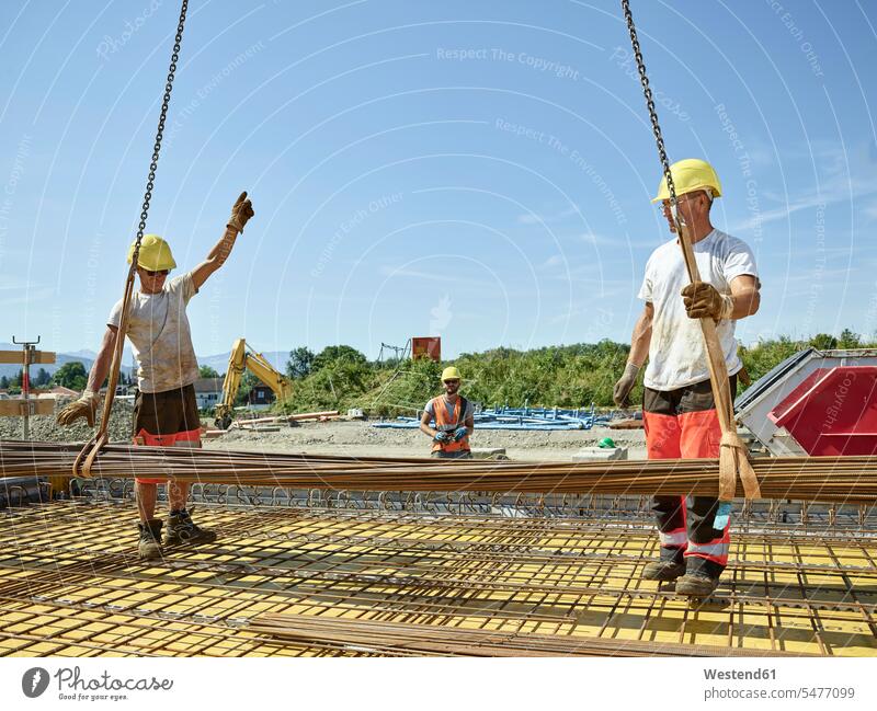 Workers on construction site preparing iron rods working At Work construction worker builders Building Site sites Building Sites construction sites craftsman