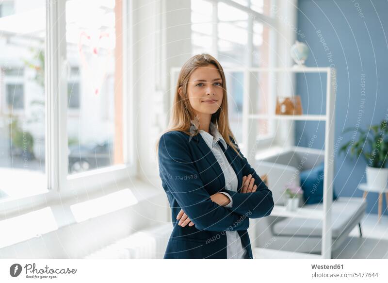 A Happy business woman, smile and standing in confidence for