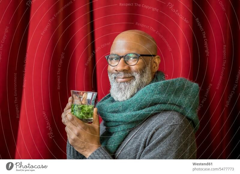 Portrait of happy man with glass of tea men males portrait portraits tea glass tea glasses Tea Teas happiness Adults grown-ups grownups adult people persons