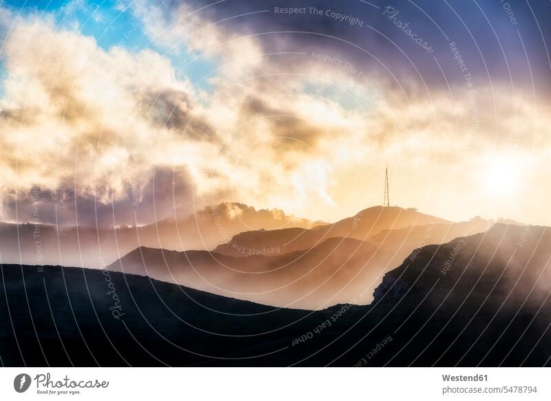 View to Sugarloaf Communication Tower at sunset, Christchurch, Canterbury, South Island, New Zealand skies clouds natural world beauty in nature remote secluded