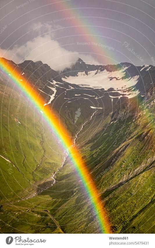 Double rainbow in mountain landscape outdoors location shots outdoor shot outdoor shots day daylight shot daylight shots day shots daytime sunlight Sunlit