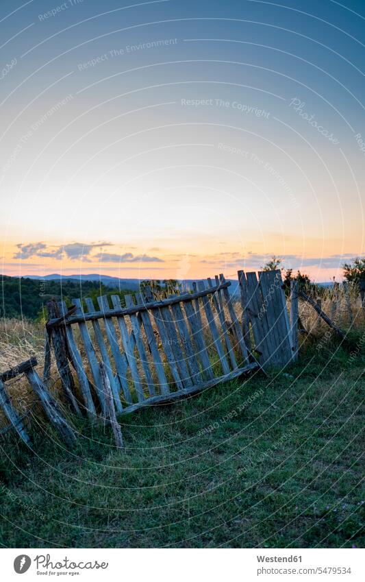 Ramshackle wooden fence in the countryside, Strandja mountains, Bulgaria skies Cultivated Land grasslands grazing land pastureland pastures copy space horizons