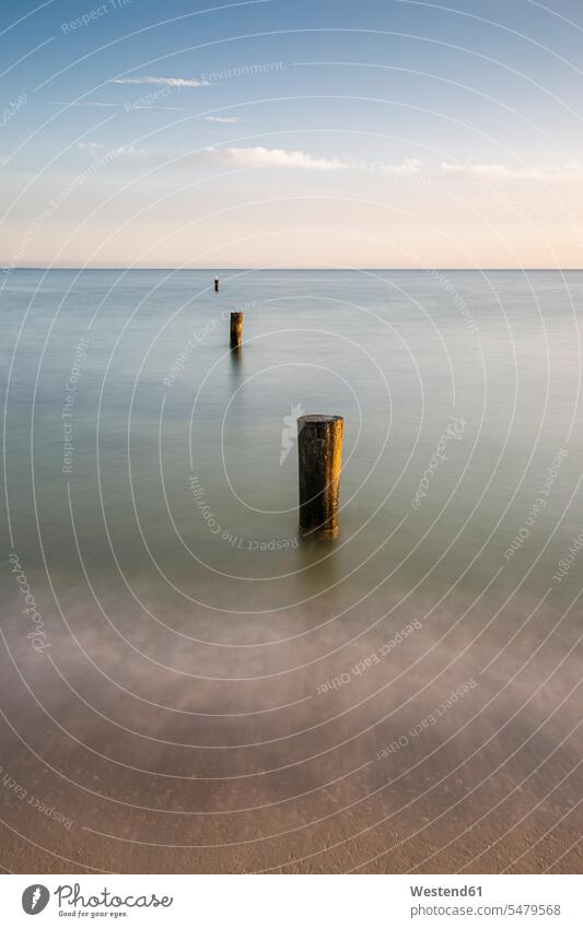 Groyne on coast of Baltic Sea at dawn outdoors location shots outdoor shot outdoor shots morning twilight in the morning atmosphere coast area coastline seaside