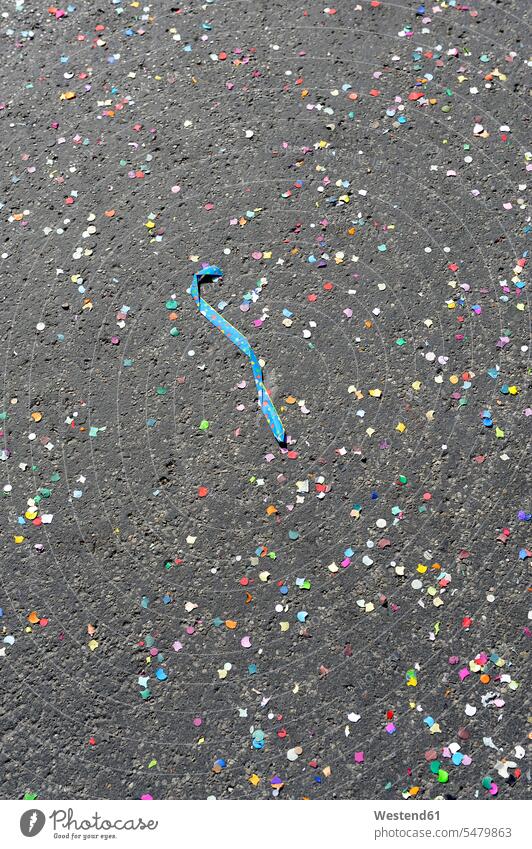 Germany, Confetti on street nobody tarmac asphalt bavarian Bavaria culture cultural Arts Culture and Entertainment Feast Day Part Of partial view overhead view