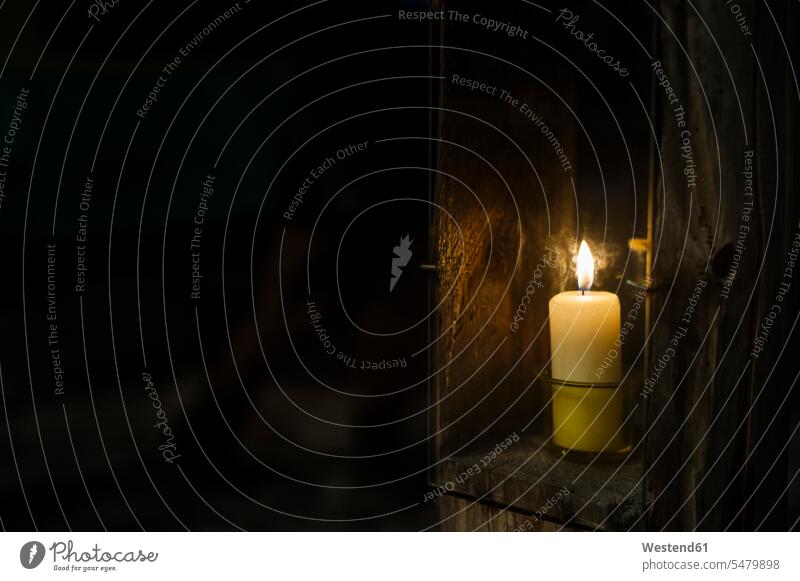 Burning candle Berchtesgadener Land storm lamp storm lamps close-up closeups close-ups close up close ups candle light wood wooden focus on foreground blurred