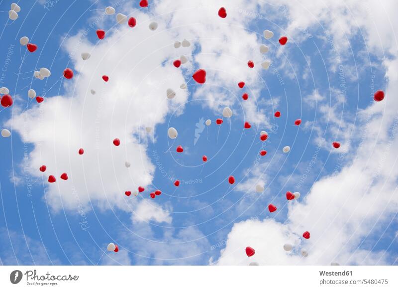 Heart-shape balloons in sky at wedding day skies Wedding getting married marrying Marriage Love loving decoration decorating decorations Celebration