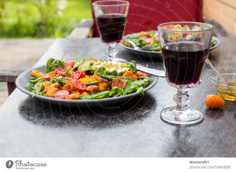 Salad and red wine glasses Wine Glass Wine Glasses Wineglass Wineglasses healthy eating nutrition Plate dish dishes Plates Rocket Rocket Salad Arugulas Roquette