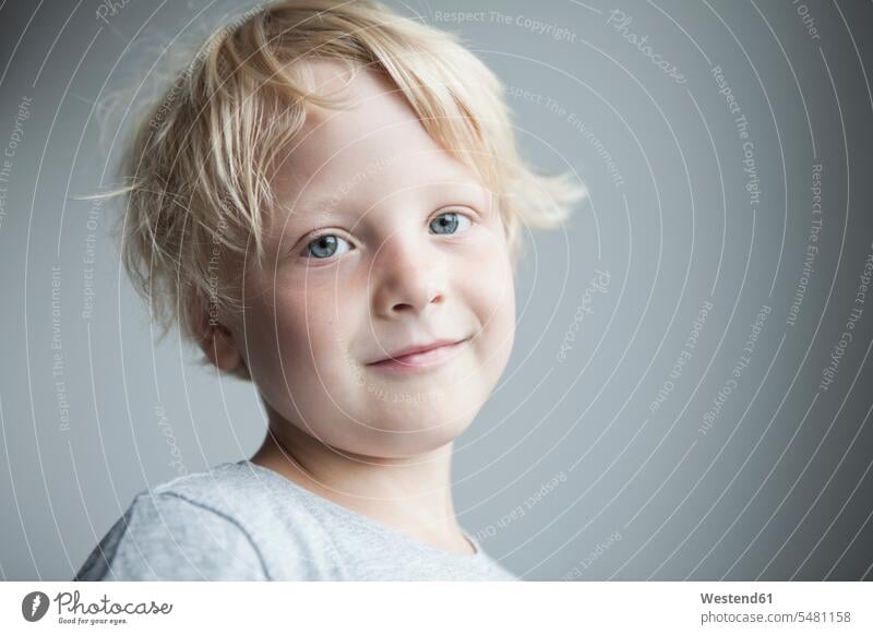 Portrait of smiling little blond boy caucasian caucasian ethnicity caucasian appearance european blond hair blonde hair smile front view frontal View From Front