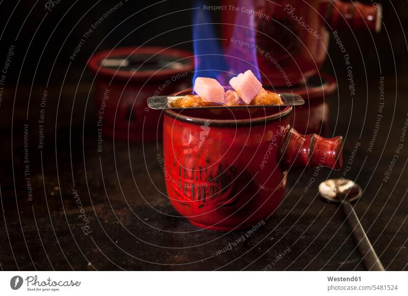 Preparing Feuerzangenbowle studio shot studio shots studio photograph studio photographs motion Movement moving metal metals metallic focus on foreground