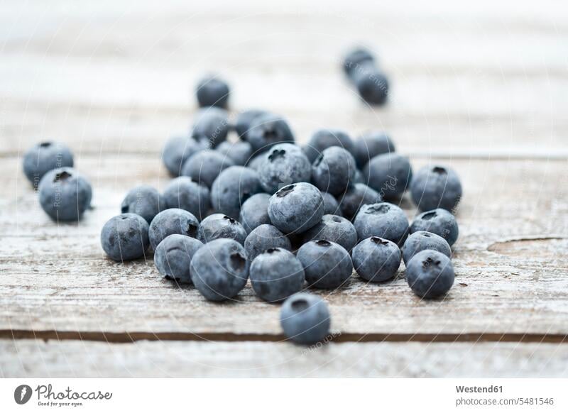Blueberries on wood Selective focus Differential Focus wooden blueberry bilberry blueberries bilberries nobody studio shot studio shots studio photograph