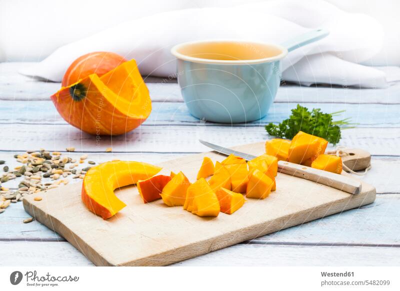 Preparation of organic pumpkin soup, chopped pieces on chopping board cut healthy eating nutrition Chopping Board Cutting Boards Chopping Boards pumpkin seed