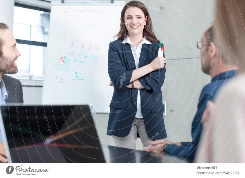 Businesswoman leading a presentation on a meeting in conference room Business Meeting business conference presentations businesswoman businesswomen