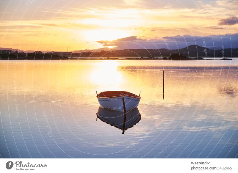 Italy, Sardinia, Murta Maria, boat on the water at sunset Travel sky skies tranquility tranquillity Calmness Mediterranean Sea View Vista Look-Out outlook