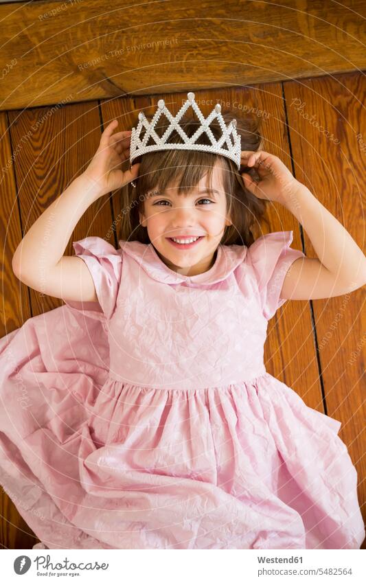 Portrait of smiling little girl dressed up as a princess caucasian caucasian ethnicity caucasian appearance european crown crowns pink Rosy Princess Princesses