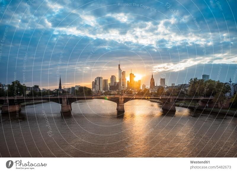 Germany, Frankfurt, view to financial district at sunset with Ignatz-Bubis-Bridge in the foreground evening in the evening Skyline Skylines Urban Skyline dusk