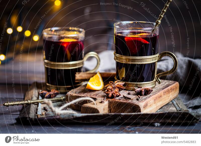 Mulled wine with oranges and spices Tray Trays old-fashioned Star Anise star-anise ready to eat ready-to-eat two objects 2 garnished tea glass tea glasses