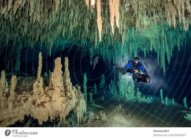 Mexico, Yucatan, Tulum, cave diver in the system Nohoch Na Chich caucasian caucasian ethnicity caucasian appearance european diving suit diving suits wetsuit