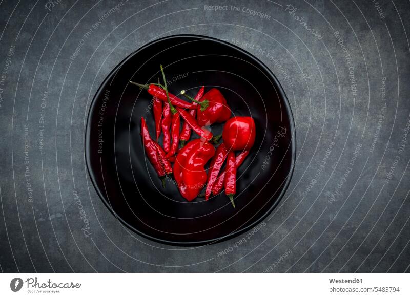Black bowl of various red chili pods food and drink Nutrition Alimentation Food and Drinks chili pepper hot pepper peppers Red Peppers hot peppers chili peppers