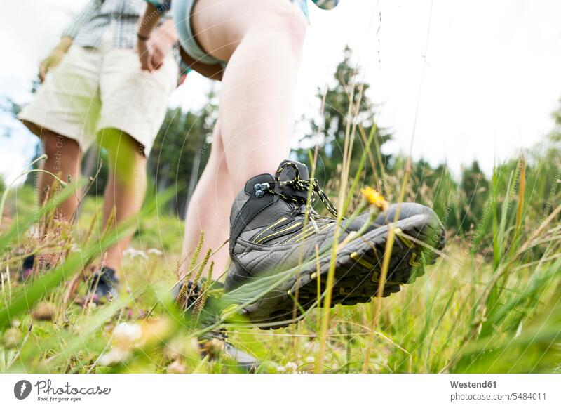 Close-up of couple on a hiking tour hike walking going twosomes partnership couples people persons human being humans human beings leisure free time