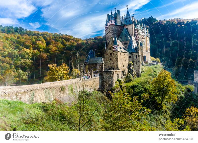 Germany, Wierschem, View to Eltz Castle in autumn cloud clouds Rhineland-Palatinate medieval Middle Ages forest woods forests autumn forest fall forest castle
