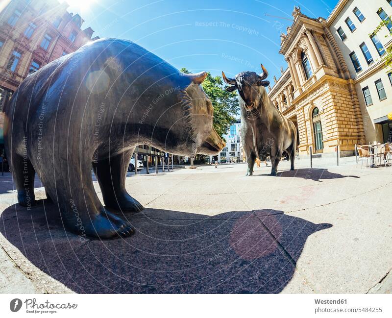 Germany, Frankfurt, bull and bear bronze sculptures at Stock Exchange sunshine Sunny Day sunny stock market stocks and shares financial market