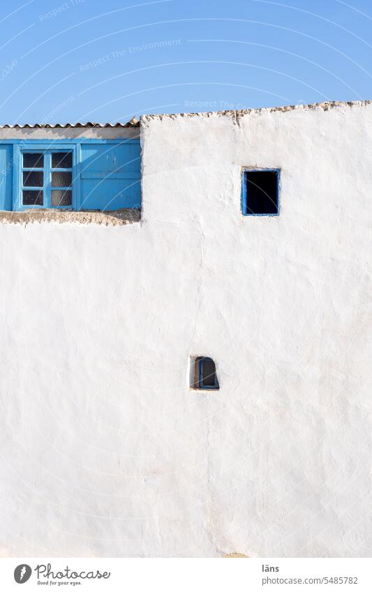 Blue eye l facade with three different windows Morocco Essaouira Facade Window Deserted Wall (building) Africa Vacation & Travel Copy Space top