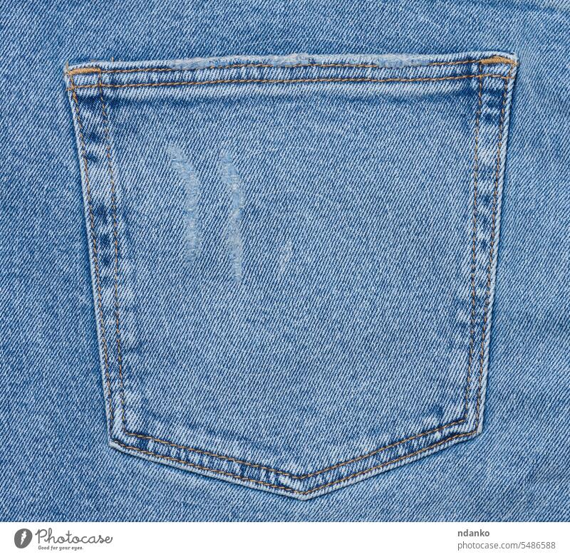 Back pocket of blue jeans pants seam stitch textile texture trousers wear apparel back canvas casual closeup clothing cotton denim design detail fabric fashion