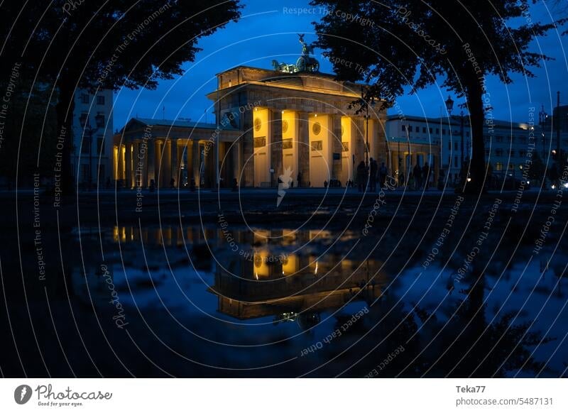 The Brandenburg Brandenburg Gate Berlin Downtown Berlin Manmade structures Germany History of the Historic East West Wall (barrier) Rain reflection