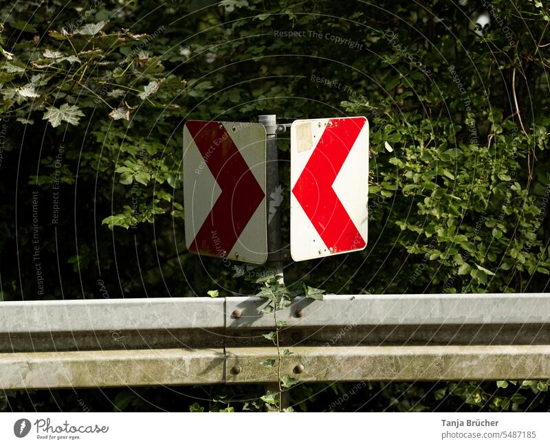 Warning signs with red arrows - Attention curve! esteem dangerous curve sharp bend Dangerous Crash barrier Curve Red arrows on white background Arrow