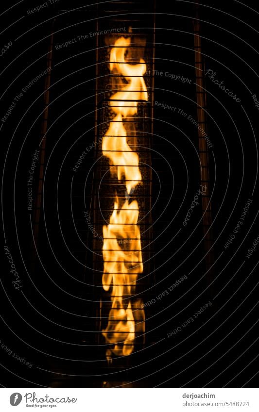 A flame in the grate Flame Fire hot fire Exterior shot pretty Metal grid Hot Burn Colour photo Fireplace Night Blaze Orange Light Deserted Yellow ardor Dark