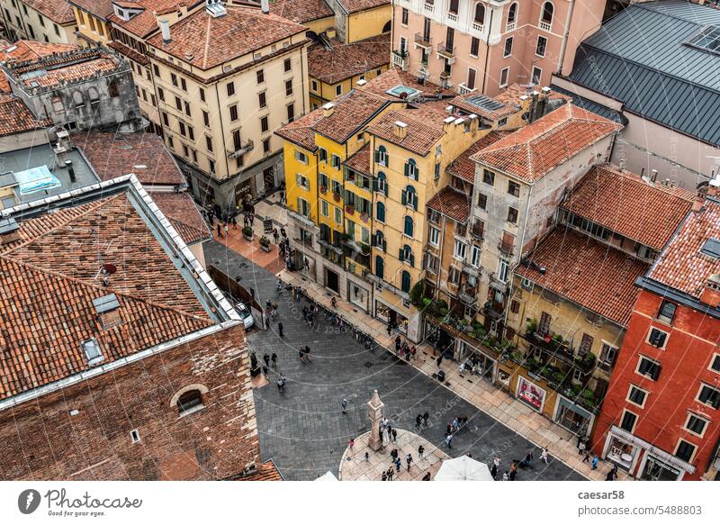 Famous panoramic view above the roofs of Verona verona tower square italy erbe piazza delle erbe buildings traditional typic architecture city europe people