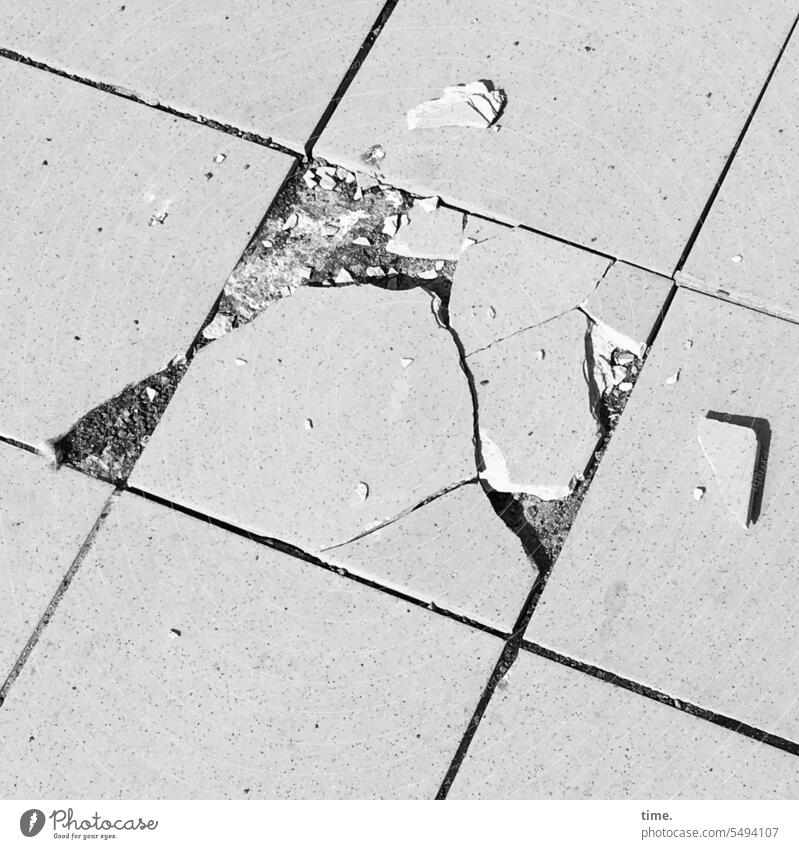 even holes do not last forever | only until the next refurbishment Base plate off Breakage Broken tile Fragment Seam crumble peril trip hazard Bird's-eye view