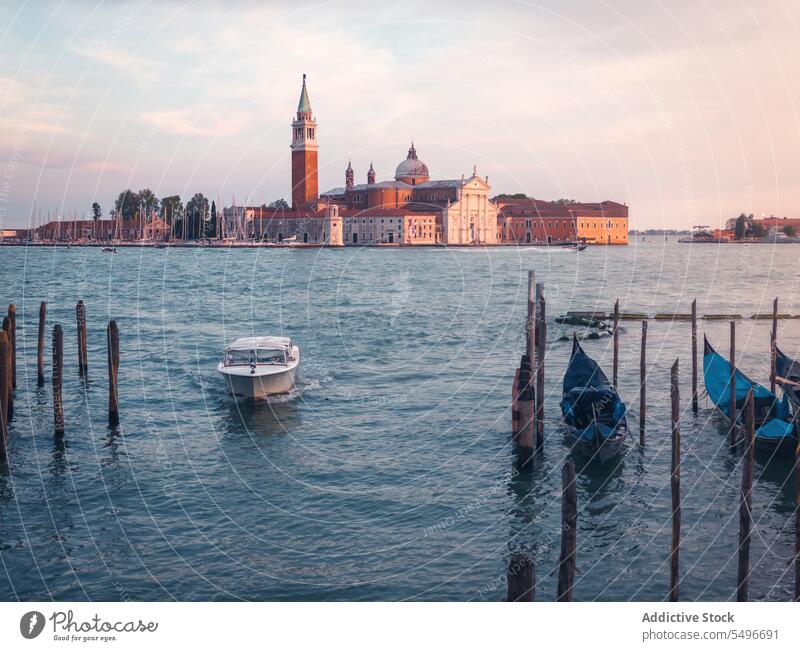 Boats against Church of Most Holy Redeemer in harbor church of most holy redeemer chiesa del santissimo redentore ancient boat gondola canal sunset spectacular